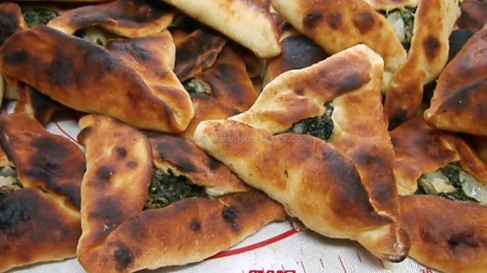 מאפה בצק ממולא עם תרד גבינות ושמן זית